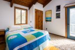 Second floor queen bedroom with loft and access to upper deck